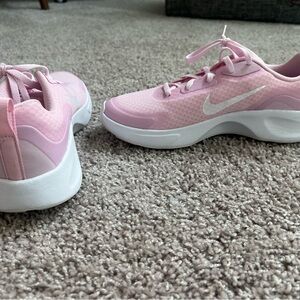 Nike tennis shoes.  Size 5.5Y